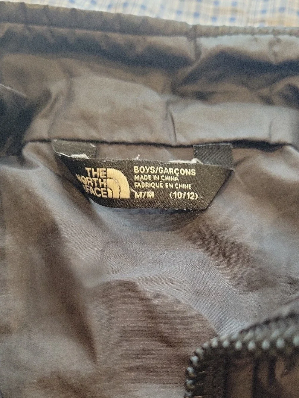 The North Face Black Quilted Jacket with Red Logo